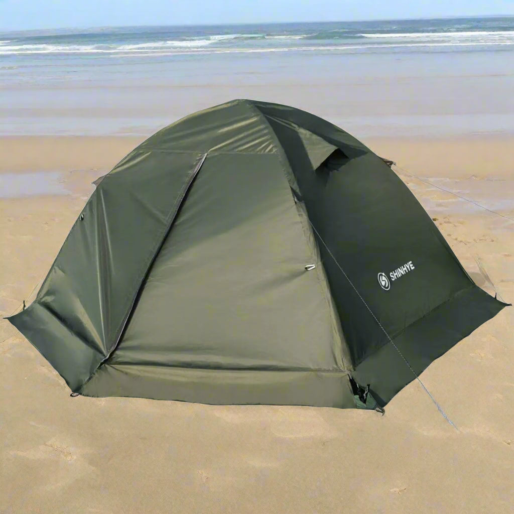 green tent on beach