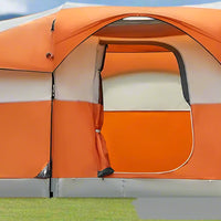 large orange tent setup in campground